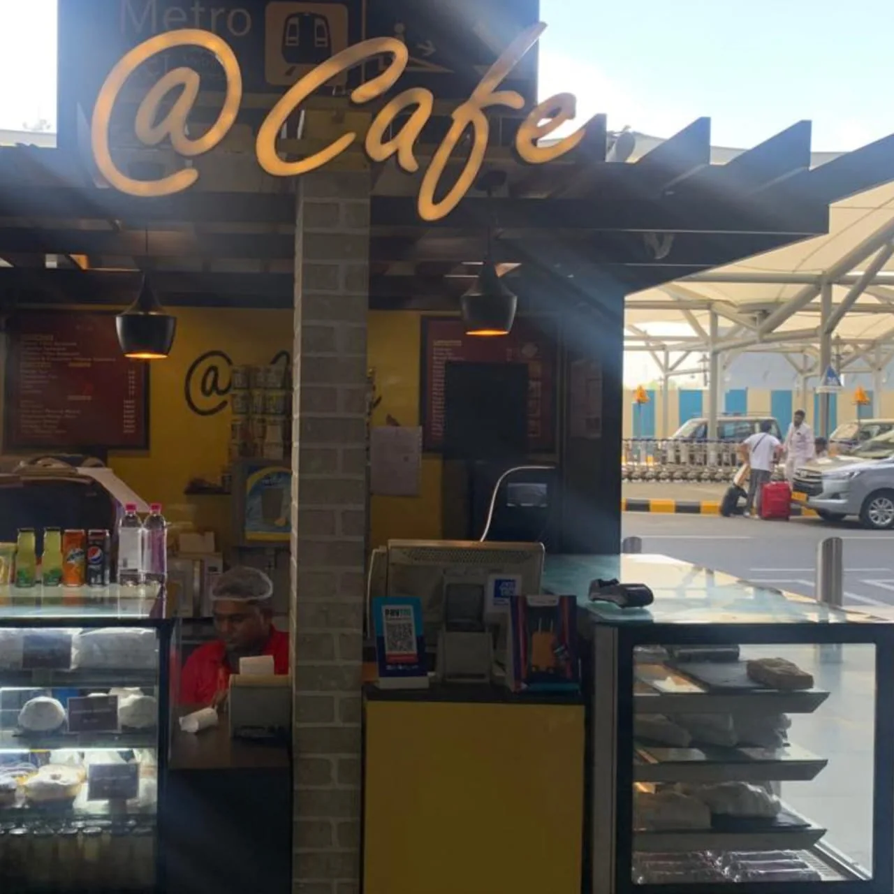 @ Cafe storefront and service counter