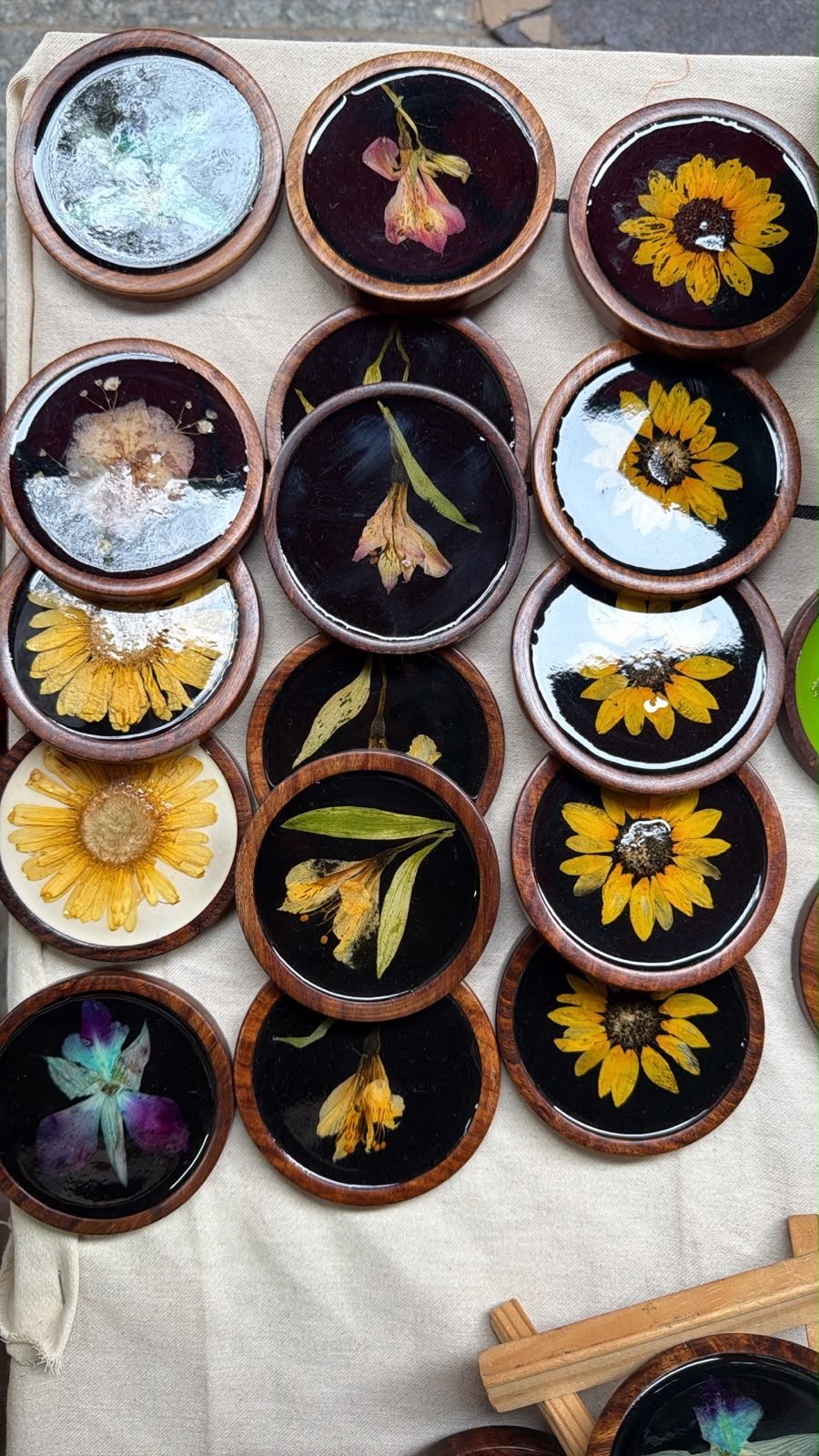 Round floral resin coasters with wood-toned edges